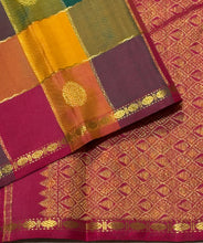 Saranga- Gorgeous Palum Pazhamum Checks with Buttas and Neli Veldhari checks woven beautiful body with small rudrakshas woven borders with rich pallu and contrast woven arakku blouse