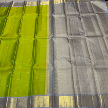 Vaibhogam- Gorgeous Parrot Green with Grey Handwoven Pure 2g Jari Korvai with Vairaoosi woven body with Buttas in a Kanjivaram Silk with rich borders gorgeous pallu and contrast woven grey vairaoosi blouse