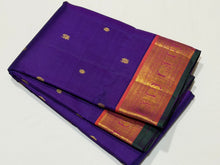 Sahana- Violetish blue with Burnt Orange Buttas Handwoven Pure Jari Kanjivaram Silk with beautiful borders with green selvedges rich pallu and contrast woven blouse