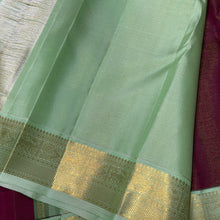 Vaibhogam- Mesmerizing Deep wine with pastel green Handwoven Pure 2g Jari Korvai Vairaoosi body with beautiful yazhis and annapakshis woven borders rich yazhi buttas woven beautiful pallu and contrast woven blouse