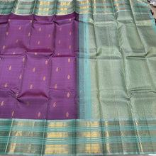 Vaibhogam- Gorgeous Medium Lavendar with Turquoise Blue Handwoven Pure Jari Korvai Buttas Woven Kanjivaram with Rich Varisaipet Borders Beautiful Pallu and Contrast Woven Blouse