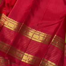 Vaibhogam- Gorgeous Parrot Green with Red Handwoven Pure Zari Korvai Kanjivaram Silk with Buttas woven body with rich doublepet vairaoosi borders with rudrakshas woven beautiful rich pallu and contrast woven red blouse