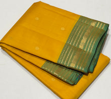 Sahana- Gorgeous Yellow with Dual tone Green Buttas Handwoven Pure Kanjivaram Silk with beautiful borders rich pallu and contrast woven blouse