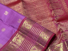 Lilac with Onion Pink Handwoven Pure Jari Kanjivaram Silk Saree with Silver Mayil Chakram motifs in body and rich borders in golden jari with beautiful pallu and contrast woven blouse