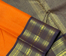 Vaibhogam- Strikingly beautiful Orange with Dark Beetlebut Brown Handwoven Pure2g Jari Korvai Kanjivaram Silk with beautiful Vairaoosi woven rich body with gorgeous varisaipet borders rich pallu and contrast woven beautiful blouse