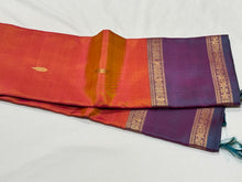 Orange with Lavendar Buttas with Simhayazhi Pallu Handwoven Pure Jari Kanjivaram Silk Saree Beauty with Rettapet Borders