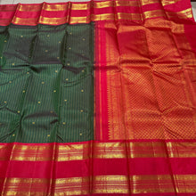 Stunning Bottle Green with Red Handwoven Pure Jari Korvai with Doublepet Rich Borders Gorgeous Pallu and Contrast Woven blouse in a Kai Korvai Handwoven Kanjivaram Silk Saree