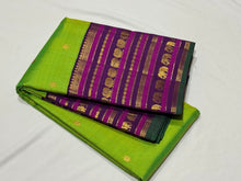 Gorgeous Sneha Green with Deep Purple Handwoven Pure Jari Korvai Kanjivaram Silk Saree with rich kamalam buttas woven body with elephants and annapakshis woven varisaipet broad borders gorgeous pallu and contrast woven blouse