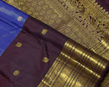 Vaibhogam- Gorgeous Ink Blue with Coffee Brown Vairaoosi with Buttas Handwoven Pure 2g Jari Kanjivaram Silk with beautiful small elephants and peacocks woven body and middle borderd and rich coffee brown borders pallu and contrast woven brown blouse