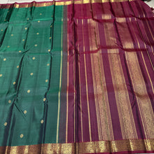 Vaibhogam- Gorgeous Bottle Green with Deep Maroon Handwoven Pure 2g Jari Korvai with Buttas Kanjivaram Silk with Self striped body with beautiful small borders rich pallu and contrast woven maroon blouse