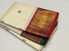 Vaibhogam-Stunning  Offwhite with Ganga Jamuna borders with gorgeous pattu buttas woven body with deep emerald green and burnt orange shade borders beautifully woven rich pallu and contrast woven blouse