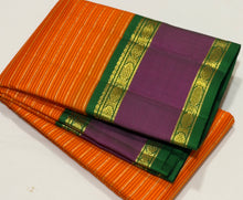 Vaibhogam- Gorgeous Orange with Emerald Green Handwoven Pure Jari Korvai Kanjivaram Silk with beautiful jari veldhari stripes and silk thread striped body with beautiful doublepet borders with rich pallu and contrast woven blouse