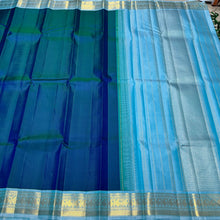 Sarasangi-Gorgeous Deep Peacock Blue with Soft Baby Blue Combination in a Handwoven Pure Jari Korvai Kanjivaram Silk with beautiful borders rich seer pallu and contrast woven blouse