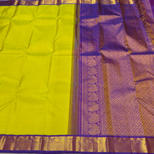 Sarasangi -Beautiful Lime Green with Purple Handwoven Pure Jari Korvai Kanjivaram Silk with small borders with elephants yazhis and peacocks woven borders rich pallu and contrast woven beautiful blouse