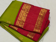 Vaibhogam- Gorgeous Parrot Green with Red Handwoven Pure Zari Korvai Kanjivaram Silk with Buttas woven body with rich doublepet vairaoosi borders with rudrakshas woven beautiful rich pallu and contrast woven red blouse