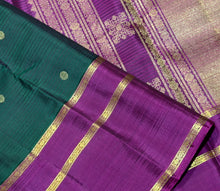 Sahana- Stunning Bottle Green with Dark Magenta Buttas Handwoven Pure 2g Jari Kanjivaram Silk with long and short beautiful borders with rich pallu and contrast buttas woven blouse
