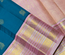 Vaibhogam- Gorgeous Peacock Blue with Soft Pink Handwoven Pure Jari Korvai Kanjivaram Silk  with mayil chakram buttas woven body with rich meenakari borders beautiful and intricately woven pallu and contrast woven blouse