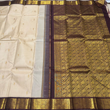 Sarasangi-Gorgeous Offwhite with Coffee Brown Handwoven Pure Korvai Kanjivaram Silk Saree with rich beautiful yazhis and annapakshis woven borders rich pallu and contrast woven blouse