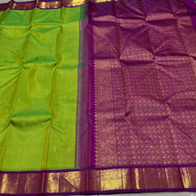 Vaibhogam-Mesmerizing Sneha Green with  purple handwoven pure Jari Korvai Kanjivaram silk with rich borders buttas woven body gorgeous pallu and contrast woven beautiful blouse
