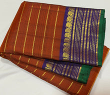 Sahana- Stunning  Rust Orange with Purple Handwoven Pure Jari Kanjivaram Silk with Jari Veldhari Body with rich borders pallu and contrast woven blouse