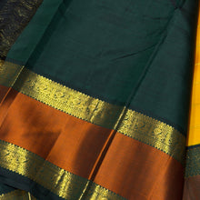 Vaibhogam- Stunning Yellow with Bottle Green Handwoven Pure2g Jari Korvai Kanjivaram Silk with Jari Veldhari woven body with rich silk threads and Jari woven beautiful borders gorgeous pallu and contrast woven blouse