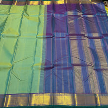 Nayaki- Gorgeous Pastel Green with Double tone Blue Handwoven Pure Kanjivaram Silk with beautiful bawanchi borders with rich pallu and contrast woven blouse