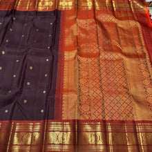 Gorgeous Chocolate Brown with Burnt Orange Handwoven Pure Kanjivaram Silk Saree with beautiful buttas rich borders and pallu woven body with a contrast woven blouse