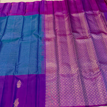 Sahana- Gorgeous Peacock Blue with Purple Kottadi Jari Checked body with beautiful buttas woven borders on either sides with rich pallu and contrast woven blouse