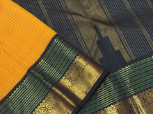 Stunning Mango Yellow with Bottle Green and Black Handwoven Jari Korvai Kanjivaram with striped body rich double side varisai borders with meenakari strips and kamalam motifs and mayilkan bhttas woven in the borders rich pallu and contrast woven blouse