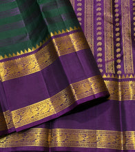 Vaibhogam-Stunning Bottle Green with Purple Handwoven Pure Jari Korvai Kanjivaram Silk with pattu veldhari strips woven beautiful body with rich rettapet borders gorgeous pallu and contrast woven blouse