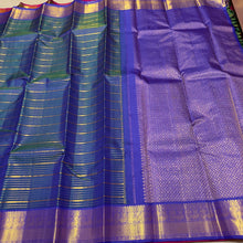 Vaibhogam- Peacock Greenish Blue with Deep Violetish Blue Handwoven Pure 2g Jari Veldhari Striped Kanjivaram Silk with beautiful borders rich pallu and contrast Jari Striped beautiful blouse