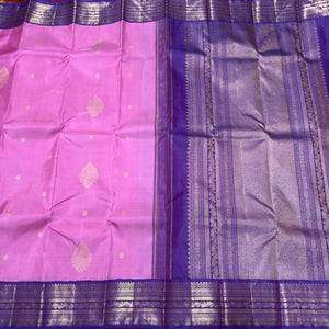 Medium tone Lotus Pink with Violetish Purple Handwoven Pure Silver and Gold twisted Jari Korvai with Buttas Kanjivaram Silk Saree Beauty