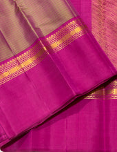 Sahana- Gorgeous Manthulir Green with Deep Pink Muthukattam Handwoven Pure Jari Kanjivaram Silk with beautiful body spaced borders rich pallu and contrast woven blouse