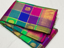 Multichecks with Buttas Rainbow Palum Pazhamum Checks with Mayil Chakram Buttas rich borders gorgeous Pink Pallu and Jari Striped Blouse Beauty