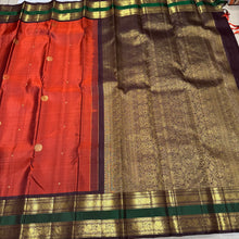 Gorgeous Burnt Orange with Brown Buttas Handwoven Pure Jari Kanjivaram Silk with Rettapet Borders Rich Pallu and Contrast woven beautiful blouse