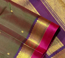 Sahana- Beautiful Double tone Manthulir Green with Purple Buttas Handwoven Pure Jari Kanjivaram Silk with beautiful double colored borders rich pallu and contrast woven blouse