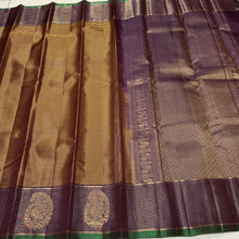 Sahana- Gorgeous Bronze Gold with Deep Purplish Brown Handwoven Pure Kanjivaram Silk with Striped body rich peacocks in paisley motifs woven borders with green selvedges rich pallu and contrast woven blouse