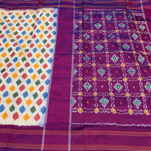 Arabhi- Gorgeous Offwhite with Dark Magenta Handwoven Pure Ikat Silk without Zari woven body with multicolored polka dots with rich pallu and contrast woven blouse