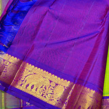 Sarasangi-Beautiful Bright Sneha Green with Violetish Purple Handwoven Pure Korvai Kanjivaram Silk with rich elephant and peacock motifs woven borders rich pallu and contrast woven blouse