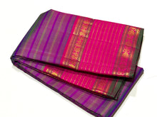 Sahana-Stunning Double tone Blue Green body with striped purple and green lines with gorgeous veldhari striped rettapet borders rich pink seer pallu and contrast woven blouse
