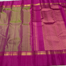 Sahana- Gorgeous Manthulir Green with Deep Pink Muthukattam Handwoven Pure Jari Kanjivaram Silk with beautiful body spaced borders rich pallu and contrast woven blouse
