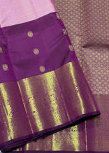 Vaibhogam- Mesmerizing Lotus Pink with Dark Magenta Purple Handwoven Pure 2g Jari KanjivaramSilk with Jarioosi checked body with beautiful mayil chakram motifs woven middle borders with beautiful long and short lower borders pallu and contrast wove blouse