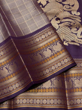 Saraswati- Gorgeous Abirami Beige with  Deep Purple Handwoven Premium Zariless Kanjivaram Silk with beautiful muthukattam silk checked body with gorgeous varisaipet borders rich sorgavaasal pallu and contrast woven blouse #thambooriexclusives #thambooricl