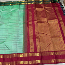 Vaibhogam- Beautiful Pista Green with Ganga Jamuna Borders Handwoven Pure Jari Korvai Kanjivaram Silk in bottle green and deep red with Neliveldhari woven beautiful body with fish woven doublepet borders rich pallu and contrast woven blouse
