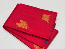 Strikingly beautiful Red with Peacock Blue Handwoven Pure Jari Borderless Muthukattam with Buttas Kanjivaram Silk Saree with double parrot motifs woven body rich pallu and contrast buttis woven blouse