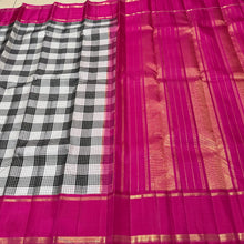 Sarasangi- Gorgeous Handwoven Pure Jari Korvai Kanjivaram Silk in Black and White Checks with beautiful Pink bodi rettapet borders rich seer pallu and contrast woven beautiful blouse