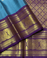 Sahana- Beautiful Teal Blue with Aubergine Purple Handwoven Pure 2g Jari Kanjivaram Silk with beautiful buttas woven body with rich elephants woven borders gorgeous pallu and contrast woven blouse