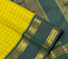 Sahana- Stunning Lemon Sampanga with Bottle Green Handwoven Pure 2g Jari Korvai Kanjivaram Silk with Checked body with rettapet double borders rich pallu and contrast woven blouse