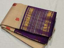 Vaibhogam- Stunning Sandal White with Purple Handwoven Pure Jari Korvai Kanjivaram Silk with thread buttas woven beautiful body with rich Borders gorgeous pallu and contrast aubergine blouse