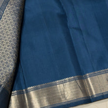 Sahana- Stunning Deep Sapphire Blue Monotone Handwoven Pure Kanjivaram Silk with Twisted Silver & Gold Zari Gandaberundas woven body with rich seepurekku borders rich pallu and self colored blouse